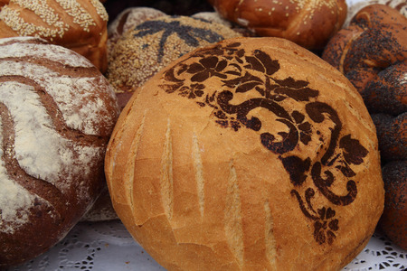 Fresh fragrant bread on the table.の写真素材