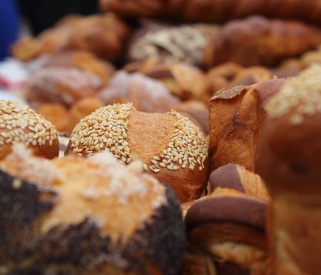 Fresh fragrant bread on the table, bakery products close-up.