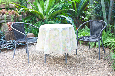 Chair and table in garden for relax time の写真素材