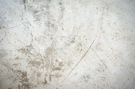 Grunge wall texture background. Floor surface with cracks and scratchesの写真素材