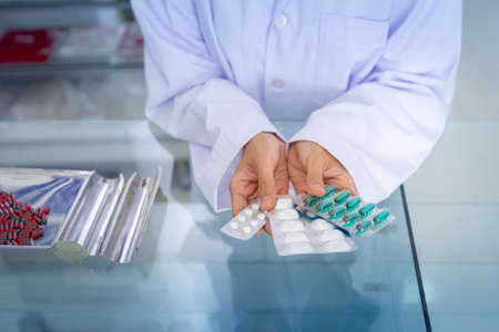Medicine on pharmacy counter. Healthcare, medical and pharmacy concept.の写真素材