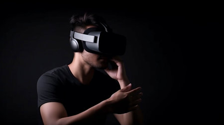 An adult bearded man wearing casual clothing and a VR headset is shown in a studio shot browsing virtual reality.The Generative AIの素材
