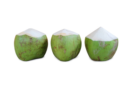 Green coconuts on white backgroundの写真素材