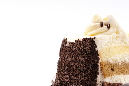 Close-up Cake with cream isolated on white backgroundの写真素材