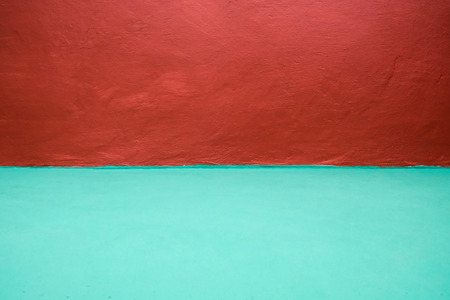 green floor and red wall backgroundの写真素材
