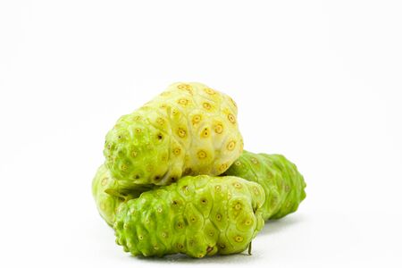 noni fruit on a white backgroundの写真素材