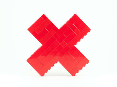 stack of red toy pieces to the calculate time signの写真素材