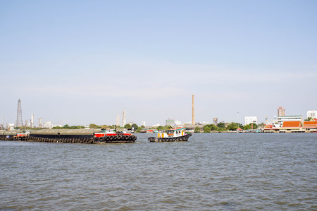cargo ship on river ,thailand- boat on river, thailandの写真素材