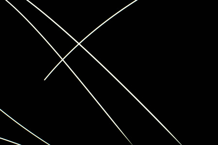 white light long exposure, white light line on black backgroundの写真素材