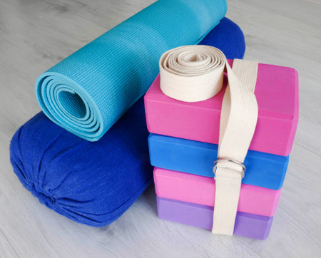 yoga props blocks, strap, roller and carpetの写真素材