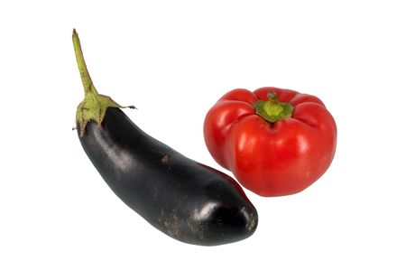 Red sweet pepper and black eggplant isolated on white backgroundの写真素材