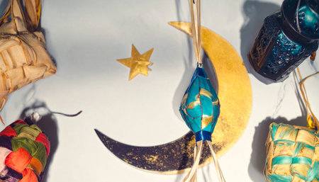 Close-up of a crescent moon, star and beads.の素材