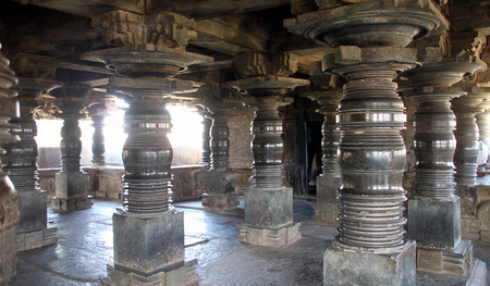 Well carved pillars of an ancient Anjaneya temple in Karnataka State of India, each pillar carved differentlyのeditorial素材