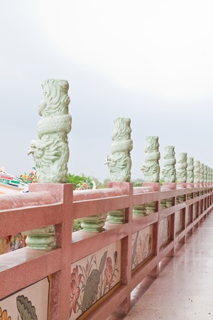 Dragon pillar at the corridor of Chinese Temple,East of Thailandの写真素材