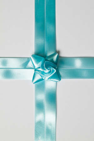 Beautiful green bow on white backgroundの写真素材