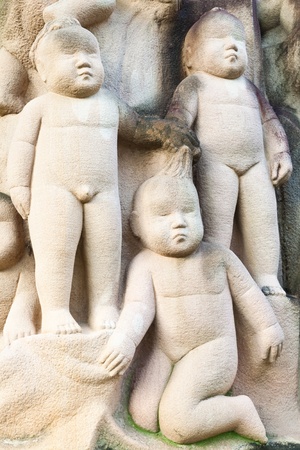 Old marble carved with lovely babyのeditorial素材