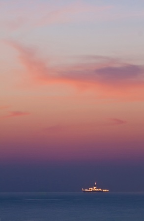 Battleship over the sea before 
sunriseの写真素材
