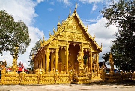 Golden Thai church against blue sky background,Chachoengsao province,Thailandの写真素材