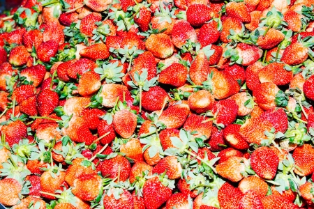 pile of strawberries on basketの写真素材