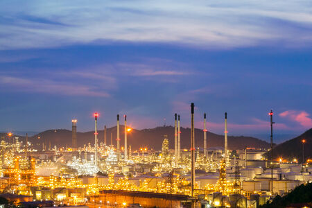 oil refinery against beautiful sunsetの写真素材