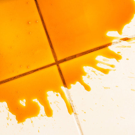 Spilled coffee on the floorの写真素材