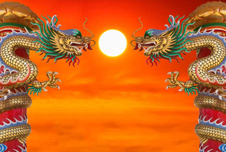 Chinese style dragon statue at sunset
