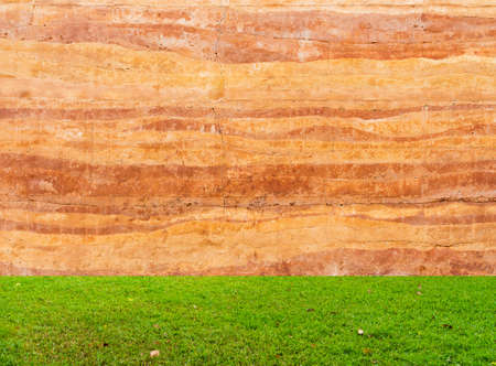 stone wall with grass floorの写真素材