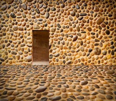 stone wall with door and stone floorの写真素材