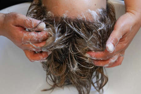 Woman shampooed in the beauty salon