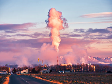 chimney smoke in winter morningの写真素材