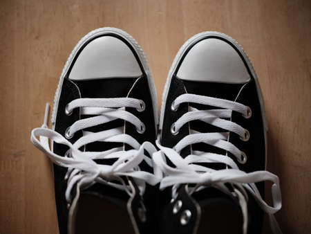 Photo of black and white sneakersの写真素材