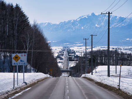 straight road in winter hokkaidoの写真素材