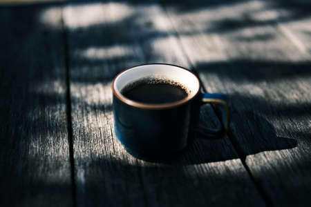 a cup of coffee on  tableの写真素材