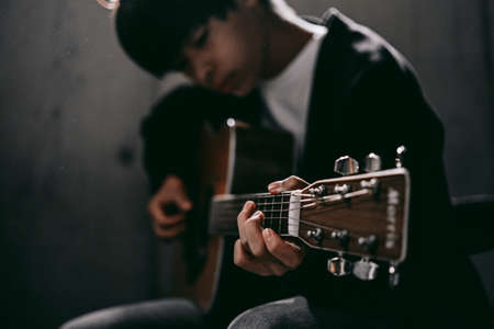 Hands of a guitar playerの写真素材