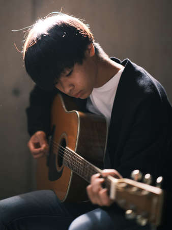 The person who plays the guitarの写真素材