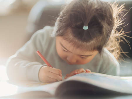 A picture of a girl drawingの写真素材