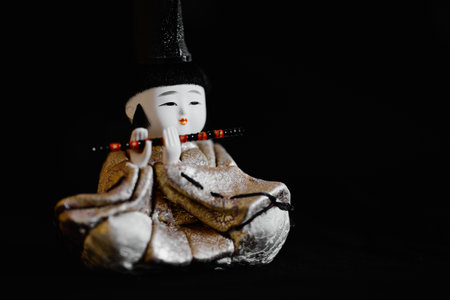 hina doll on black backgroundの写真素材