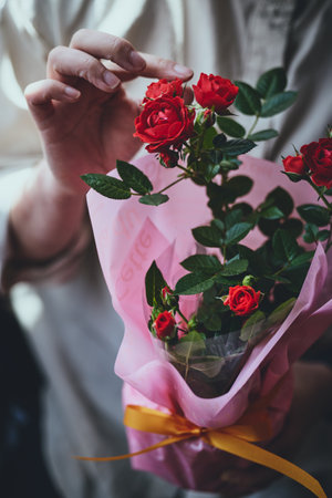 woman with red rose in Mother's Dayの写真素材