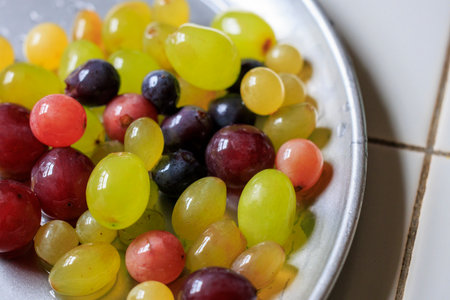 Various types of grapes on a plate