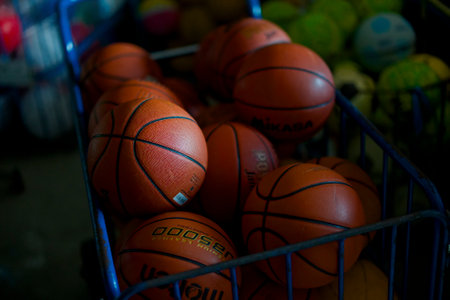 Basketball ball in a cage