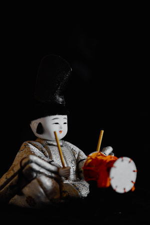 hina doll on black backgroundの写真素材