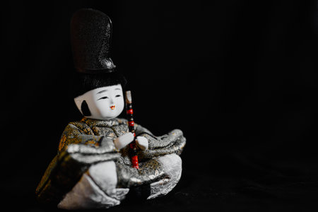hina doll on black backgroundの写真素材