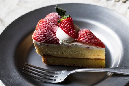 Strawberry tart on a silver plateの写真素材