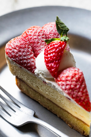 Strawberry tart on a silver plateの写真素材