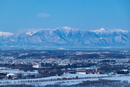 hidaka mountain range and obihiro cityの写真素材