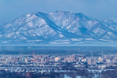 hidaka mountain range and obihiro cityの写真素材
