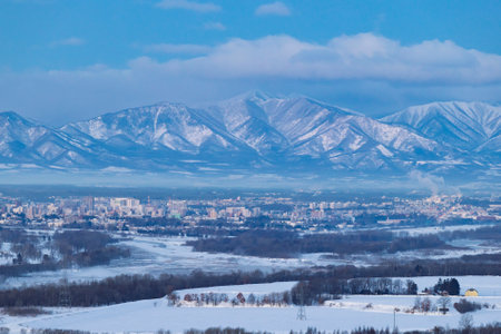hidaka mountain range and obihiro cityの写真素材