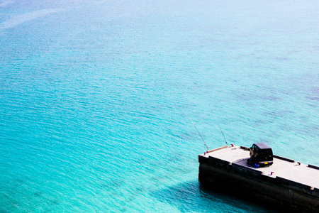 blue sea and vehicle in okinawaの写真素材