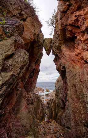 benkei trapped rock in sado islandの写真素材