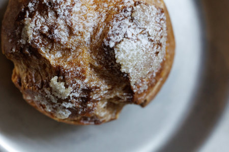 Cream puffs on a silver plateの写真素材